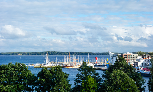 Panorama from the harbor in Eckernförde with ships at blue sky