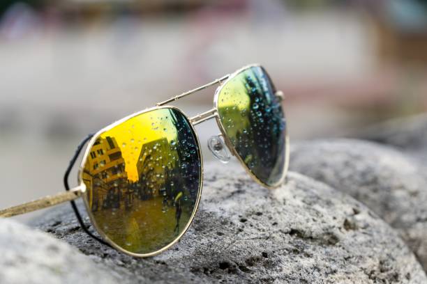 istock Sunglasses in town during rain. 1127161954