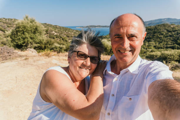 istock Senior selfies at the seaside viewpoint 1127162321