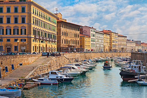 Leghorn, Tuscany, Italy: cityscape of the canal with boats