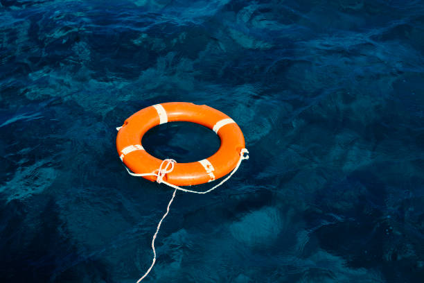 Life Buoy in the Deep Blue Sea stock photo