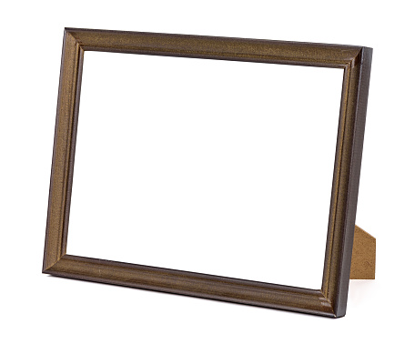 Horizontal standing brown wooden picture frame isolated on white background with clipping path