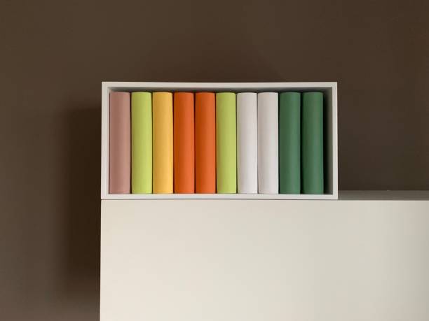 istock Colorful generic books in white book box 1127166041