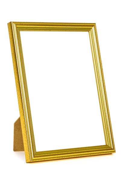 istock Standing golden picture frame on white background 1127166045