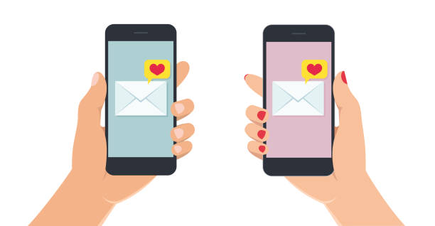 istock Female and male hands holding smartphone with love message on screen. Hand with mobile phone on white background. 1127166702