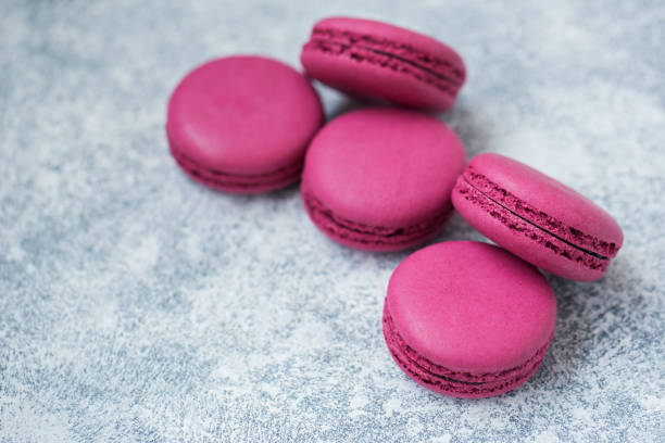 istock Macaroon cookies with black currants close-up 1127167455
