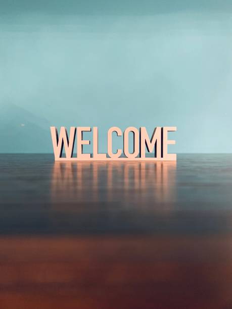 Word welcome on blue background stock photo