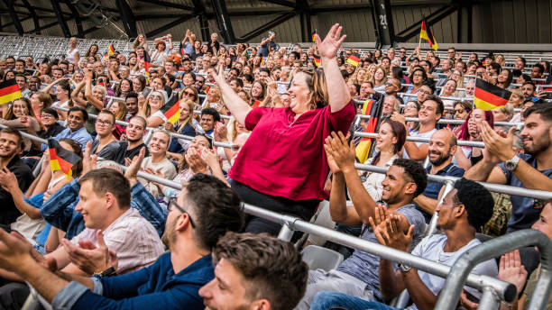 istock Germany supporters waving their flags on a stadium 1127170413
