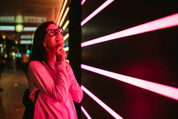 istock Woman and neon light 1127173792