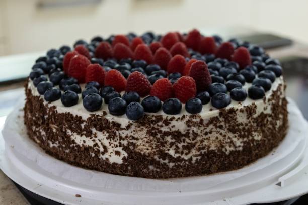 istock Raspberry and blueberry mascarpone torte cake. 1127175260