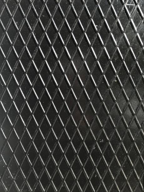 黒の背景テクスチャに鉄柵グリッド - metal metal grate plate textured ストックフォトと画像