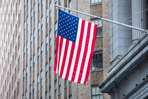 istock American Flag Hanging Outside Building 1127177011
