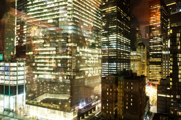 istock Illuminated Corporate Buildings At Night 1127177041