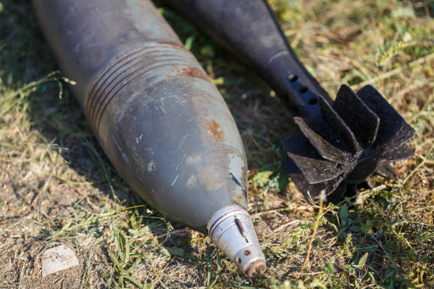 istock Two air bombs from the Second World War lie on the grass 1127178254