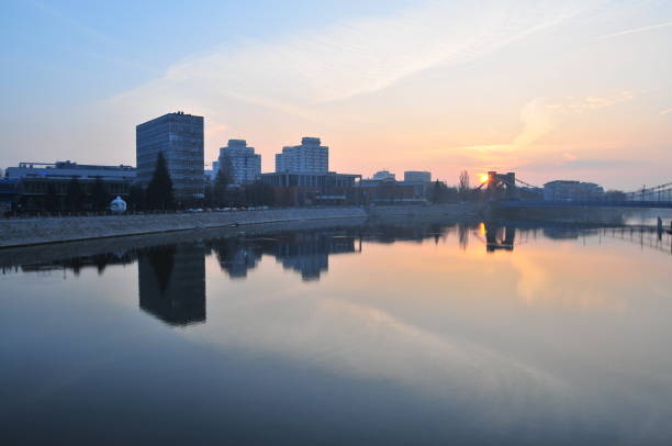 istock View of the Oder and the Grunwaldzki bridge at sunrise. Morning light 1127180130