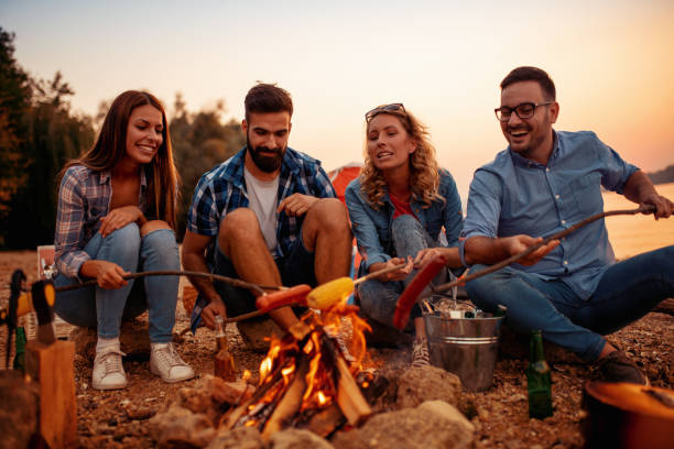 istock Group of friends making barbecue together 1127190696