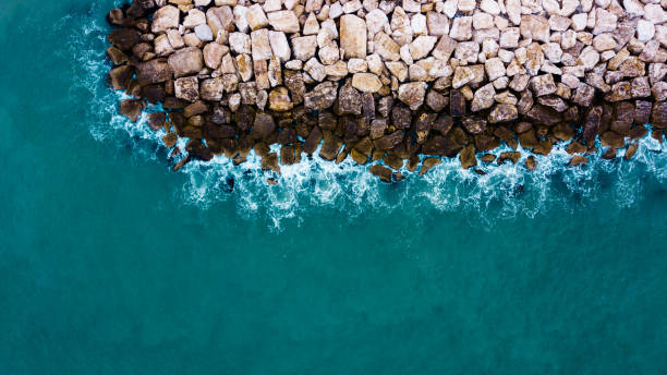 Aerial view of ocean waves and fantastic rocky coast in Cambrils, Catalonia, Spain Cambrils, Costa Daurada, Costa Dorada, Travel destination, Holidays in Spain cambrils stock pictures, royalty-free photos & images