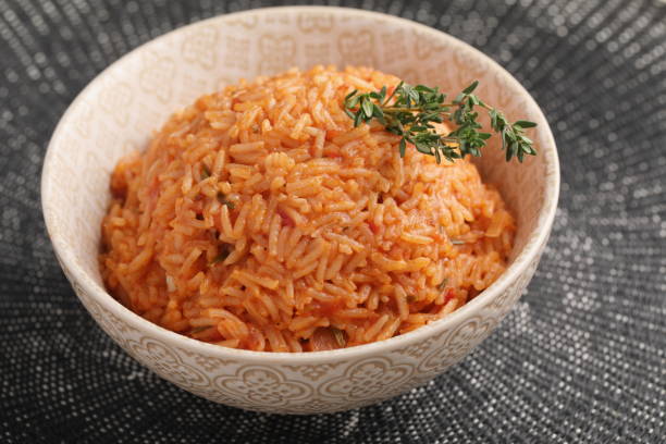 nigerian jollof rice - tomato curry imagens e fotografias de stock