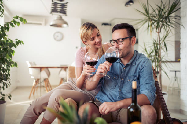 istock Romantic couple drink wine and enjoy in love 1127193561
