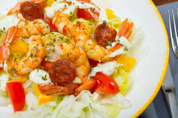 istock Salad of roasted prawns, chorizo, vegetables, lemon 1127193678