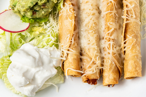 Taquitos (Mexican rolled flauta tacos), could be chicken or beef from above