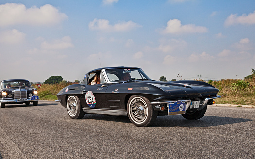 vintage American sports car Chevrolet Corvette (C2) Sting Ray (1963) in classic car race Gran Premio Nuvolari on September 16, 2018 in Ca di lugo, RA, Italy