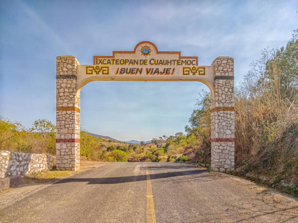 istock Exit (Welcome) sign, as seen when leaving Ixcateopan de Cuauhtemoc, Guerrero. An historic Aztec city, Travel in Mexico. 1127194932