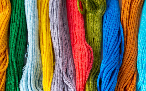 istock Colorful cotton craft close-up on burlap 1127198989