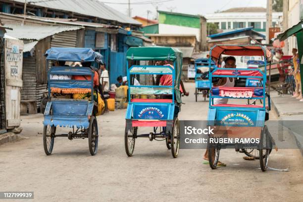 Rear View Of Three Cycle Pousse Pousse At The Commercial Center Of Toliara Madagascar Stock Photo - Download Image Now