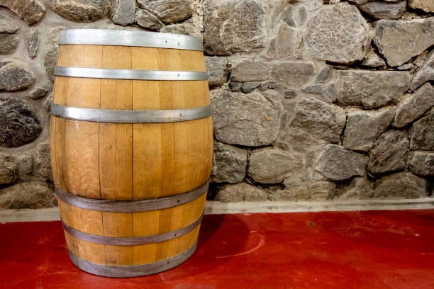 istock Wine barrels in wine-vaults in order - Imagem 1127201584