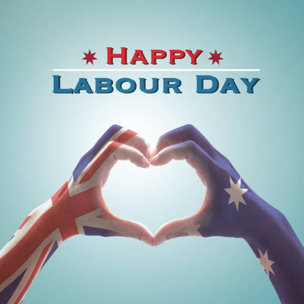 istock Happy labour day with Australia flag pattern on people hands in heart shape 1127202443
