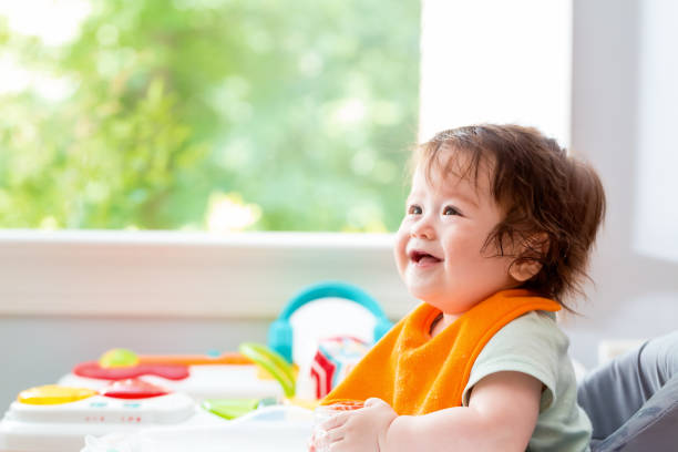 happy little baby boy with a big smile - half smile imagens e fotografias de stock