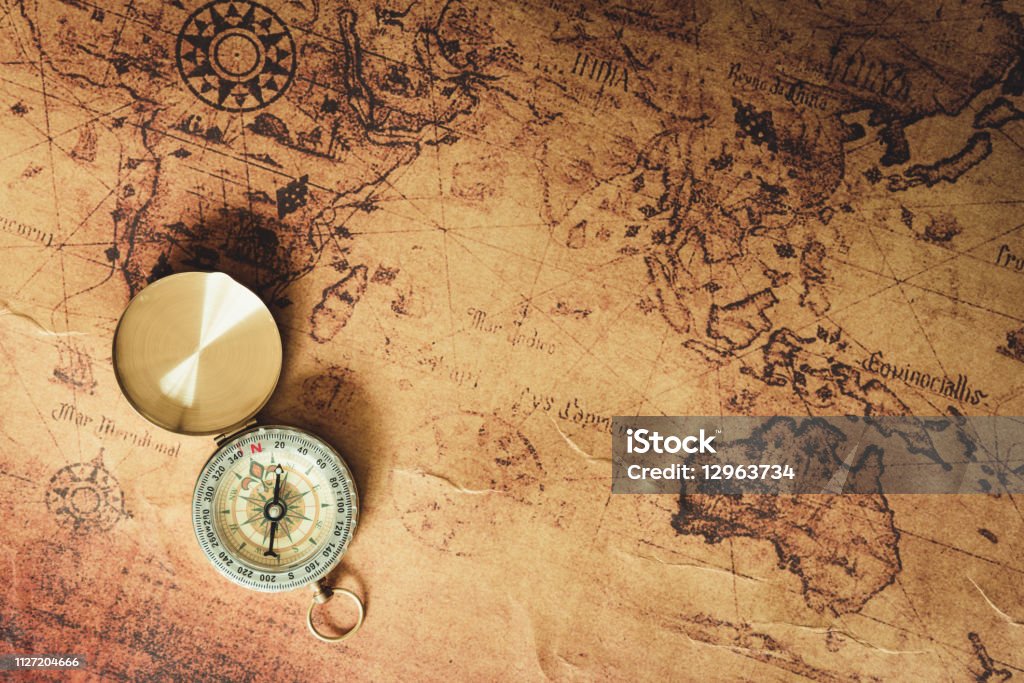 Navigator explore journey with compass and world map., Travel destination and planning vacation trip., Vintage concept. Map Stock Photo