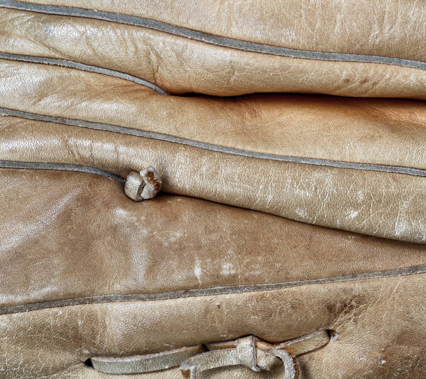 istock Close up of old leather baseball glove 1127205952