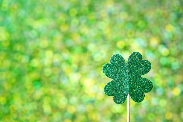 istock Saint Patricks Day shiny green clover 1127208528
