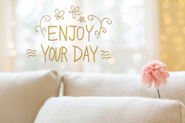 istock Enjoy Your Day message with flower in interior room sofa 1127209888