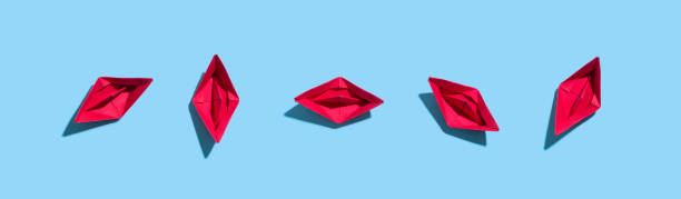 istock Collection of paper boats 1127209906