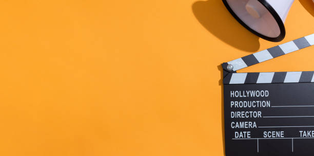 istock Movie slateboard clapper with megaphone 1127209925