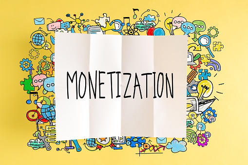 istock Monetization text with colorful illustrations 1127209954