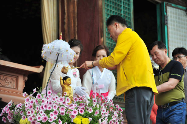 The day of Buddha's Birthday On May 22, 2018 Korean Buddhist Pouring water onto a Buddha statue at the Wibongsa Temple in Wanju-gun,South Korea.