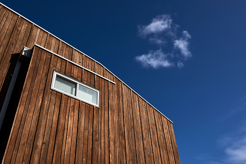 An example of modern Australian architecture in this wood cladded structure shot on a beautiful, warm sunny day.
