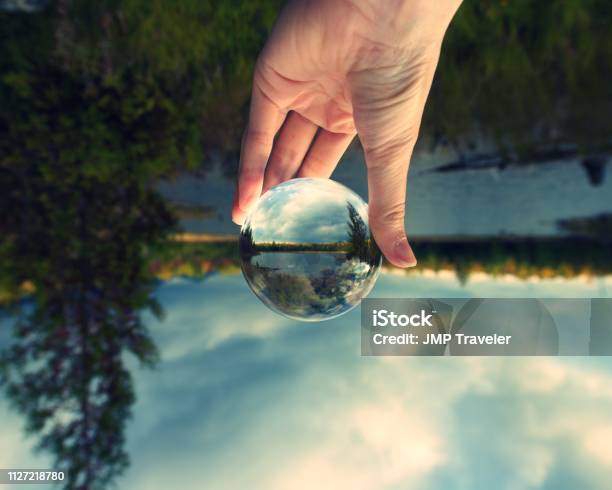 Image Upsidedown But Right Side Up In Glass Crystal Ball Stock Photo - Download Image Now