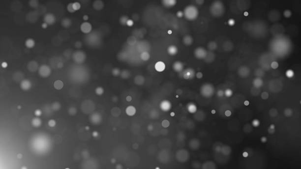 istock Beautiful celebratory white particles are in space, shallow depth of field, computer generated background, 3D render 1127223112