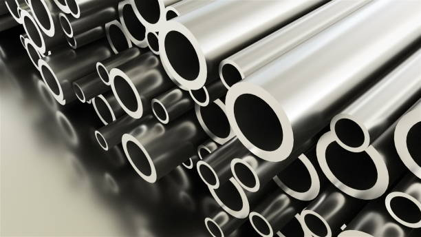 Rolled round metal industrial shiny tubes background, 3d render of metallic objects, shaped tubes stock photo