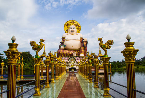 istock Statue of a fat Chinese priest 1127230630