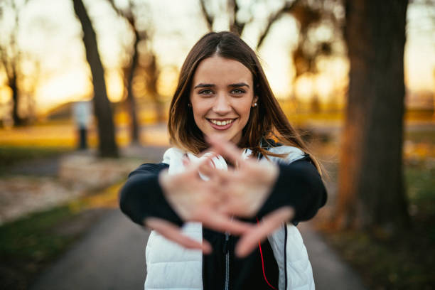 istock Woman running in the local park 1127238854