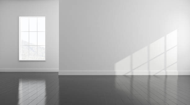 istock 3D stimulate of white empty room and dark laminate floor with sun light cast shadow on the wall,Perspective of minimal design architecture 1127239517