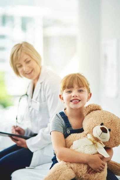 istock My doctor makes sure I grow up smiling 1127239594