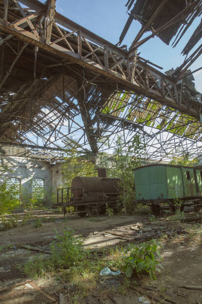 istock Abandoned and destroyed train factory 1127239917