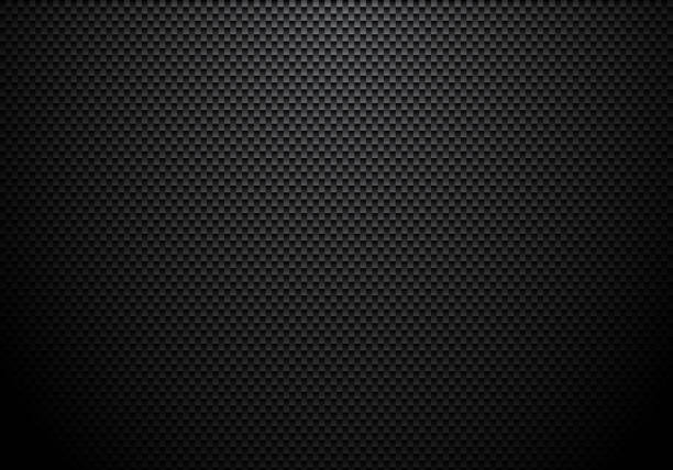istock Carbon fiber background and texture with lighting. Material wallpaper for car tuning or service. 1127240662